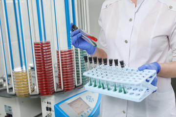 Medical test tubes in the hands