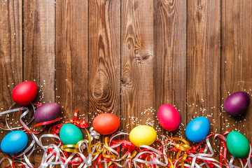 Festive eggs on empty background