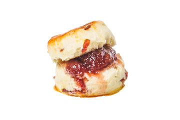Scones,Scones with jam and tea with milk close-up on the table