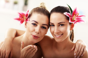 Two beautiful women in spa