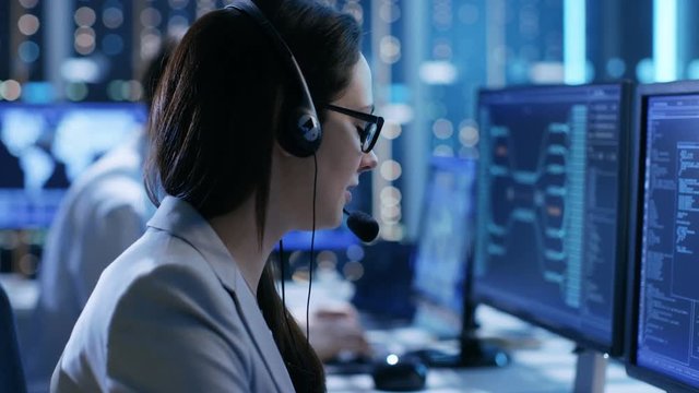 In the System Control Center Technical Support Team Gives Instructions with the Help of the Headsets.  Shot on RED EPIC-W 8K Helium Cinema Camera.