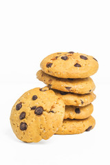 freshly baked chocolate chip cookies on rustic wooden table