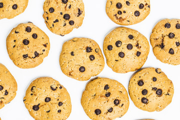 freshly baked chocolate chip cookies on rustic wooden table