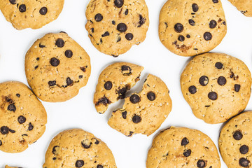 freshly baked chocolate chip cookies on rustic wooden table