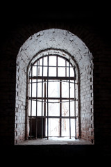 Fototapeta na wymiar Old Window Set in an Ancient Stone Building