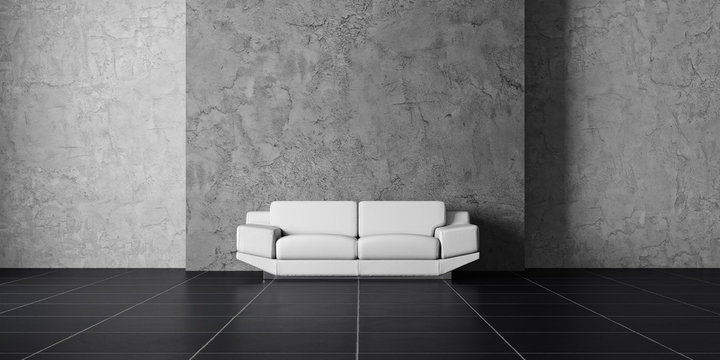 White sofa in front of concrete wall