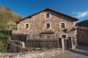 Barcena Mayor village, typical stone houses in Cantabria, Spain.