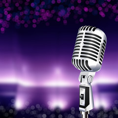 Microphone on stage against a background of auditorium