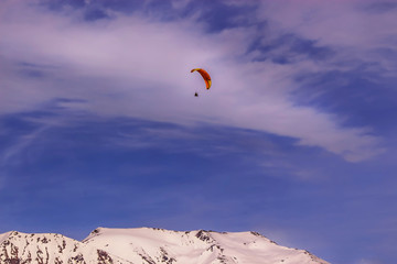 Paraglider dome in the sky above the ridge