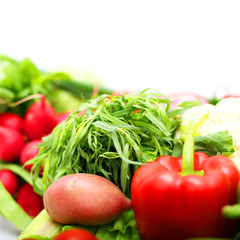 Pile of vegetables on white