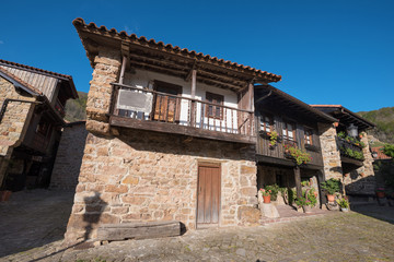 Obraz premium Barcena Mayor village, typical stone houses in Cantabria, Spain.