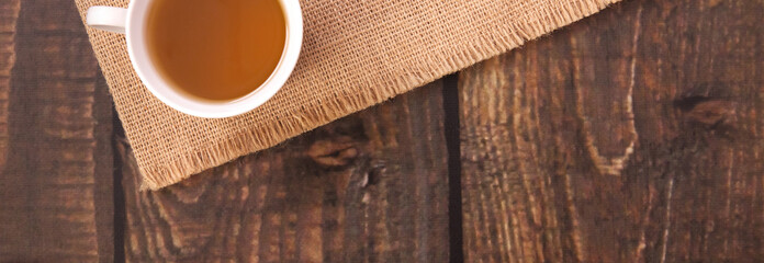 White cup of green tea