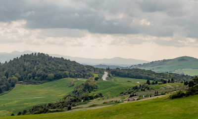 Fototapeta na wymiar Panorama of Volterra's lands and hills in the spring