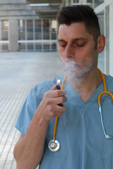 Irresponsible healthcare worker smoking in the hospital © ajr_images