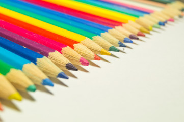 Colored pencils on a white background