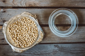 Glass jar with yellow soya