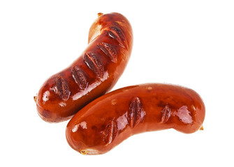 Two grilled sausages on a white background