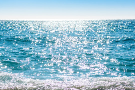 Fototapeta Sparkling rippled water surface