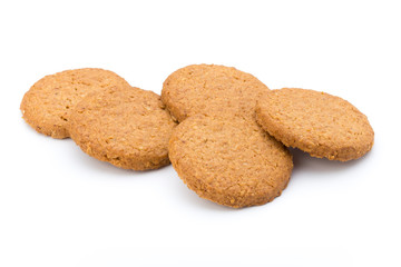 Stacked short pastry cookies isolated on white background.