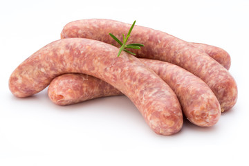 Raw sausage with parsley leaf isolated on white background.