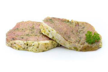 Pork chop, marinated. Isolated on the white background.
