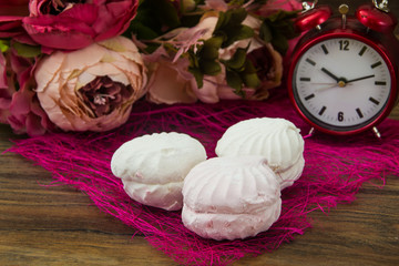 Fototapeta na wymiar Vanilla white-pink airy fruit marshmallow