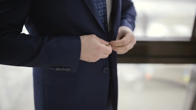 a man bottons suit