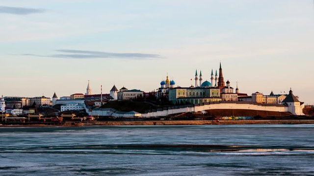 Kazan, Russia. Aerial view of Kremlin of Kazan, Russia at sunset. Time-lapse in winter from evening to night. Illuminated Kremlin with frozen river
