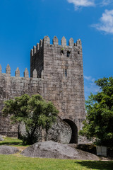 Fototapeta na wymiar Castle of Guimaraes - medieval castle in Guimaraes, Portugal.