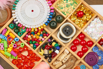 set of accessories and jewelry to embroidery, haberdashery, sewing accessories top view, seamstress workplace, many object for needlework, handmade and handicraft