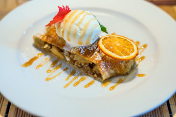 Apple strudel with vanilla ice cream
