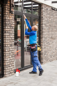 window washer working  at building outdoor