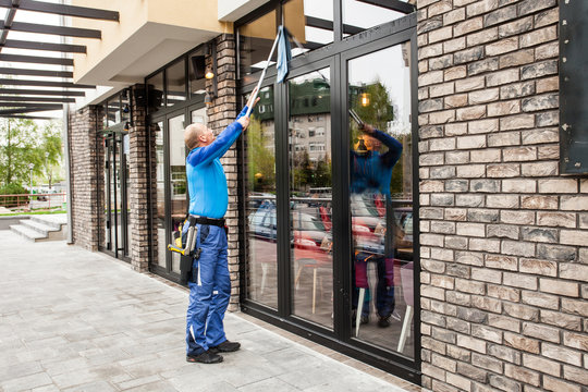window washer working  at building outdoor
