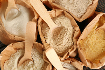 Bags with different types of flour, closeup
