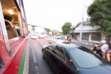 Blurred traffic jam on rush hour time, shooted from buses .
