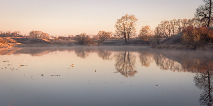View to the Church of the Intercession of the Holy Virgin on the Nerl River in sunlight.