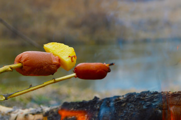 Sausage with potatoes at the stake