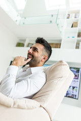 Fototapeta premium Young confident man at home