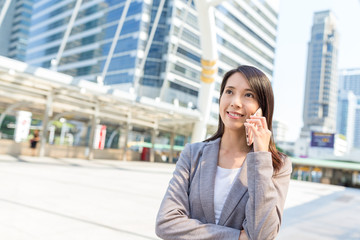 Businesswoman talk to mobile phone