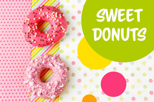 Delicious donuts on colorful background