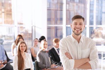 Young man at business presentation © Africa Studio