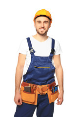 Handsome young carpenter on white background