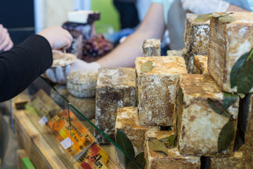 buying and selling cheese and sausage