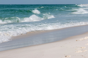 Waves breaking on the beach.