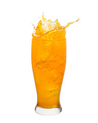 Orange juice splashing out of glass isolated on white background.
