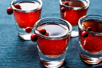 Cranberry cocktail shot with vodka