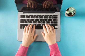 Laptop on a blue background