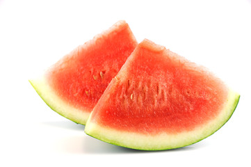 sliced fresh seedless watermelon isolated on white background