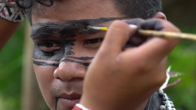Closeup shot of Face Painting - Indigenous culture of Brazil