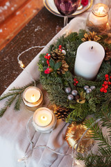 Christmas candle lights in glass. Christmas evening